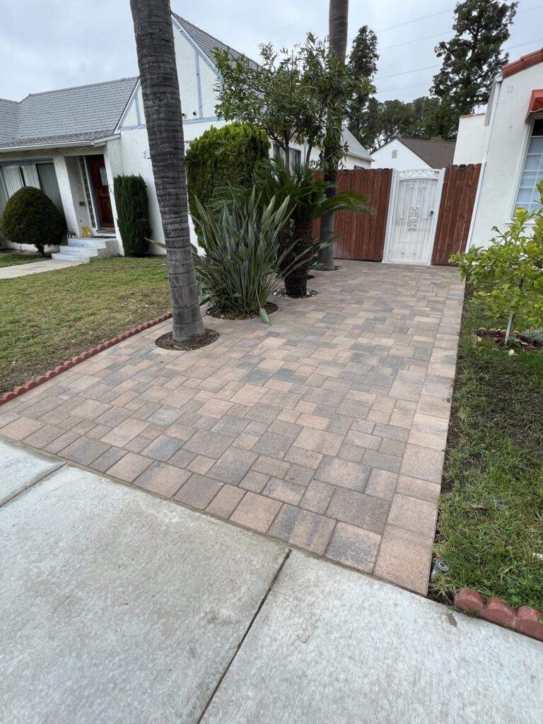 Paver patio and landscaping installed by Line of Art Construction