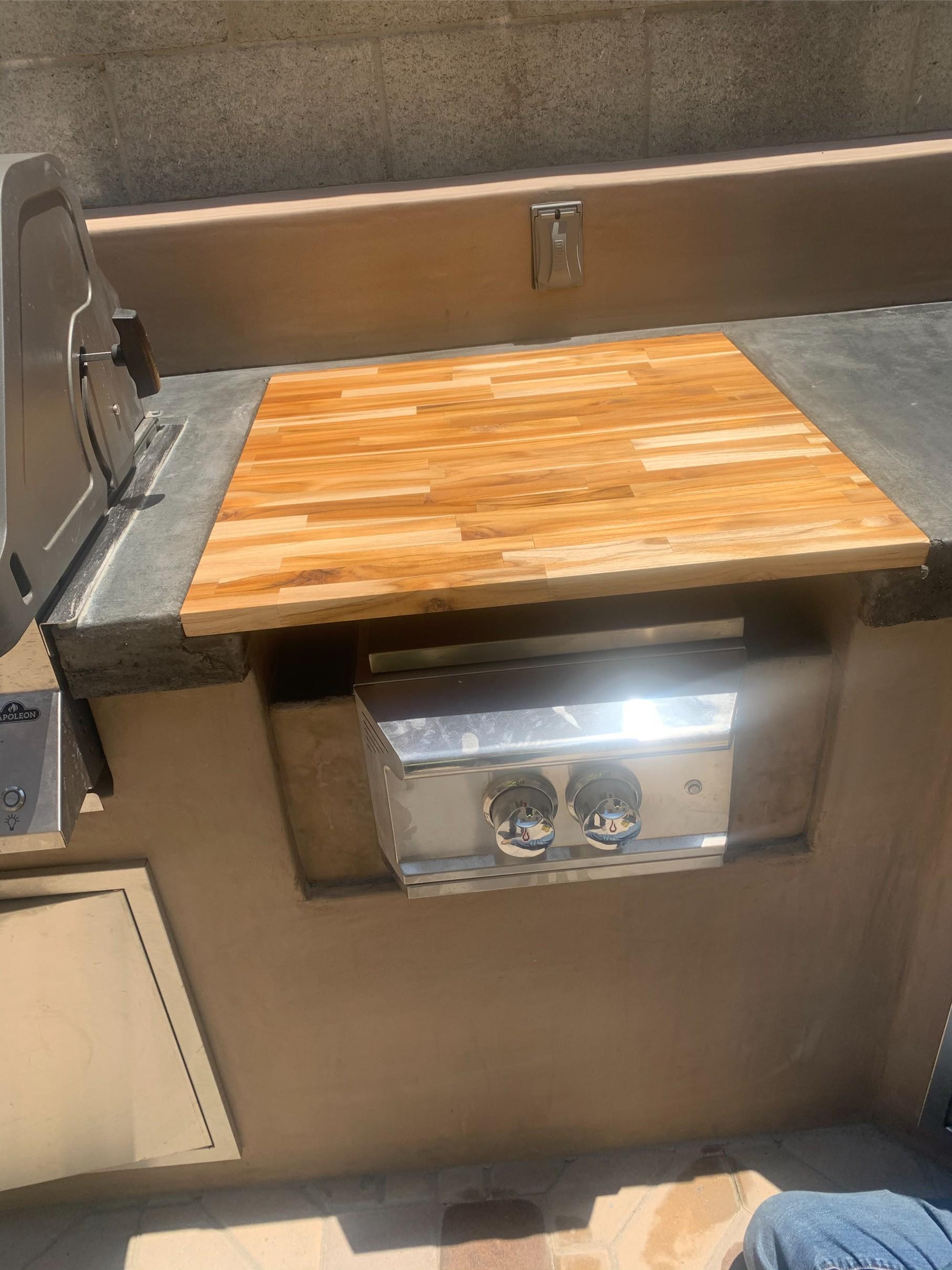 Outdoor kitchen with custom wood cutting board - Line of Art Construction, Los Angeles